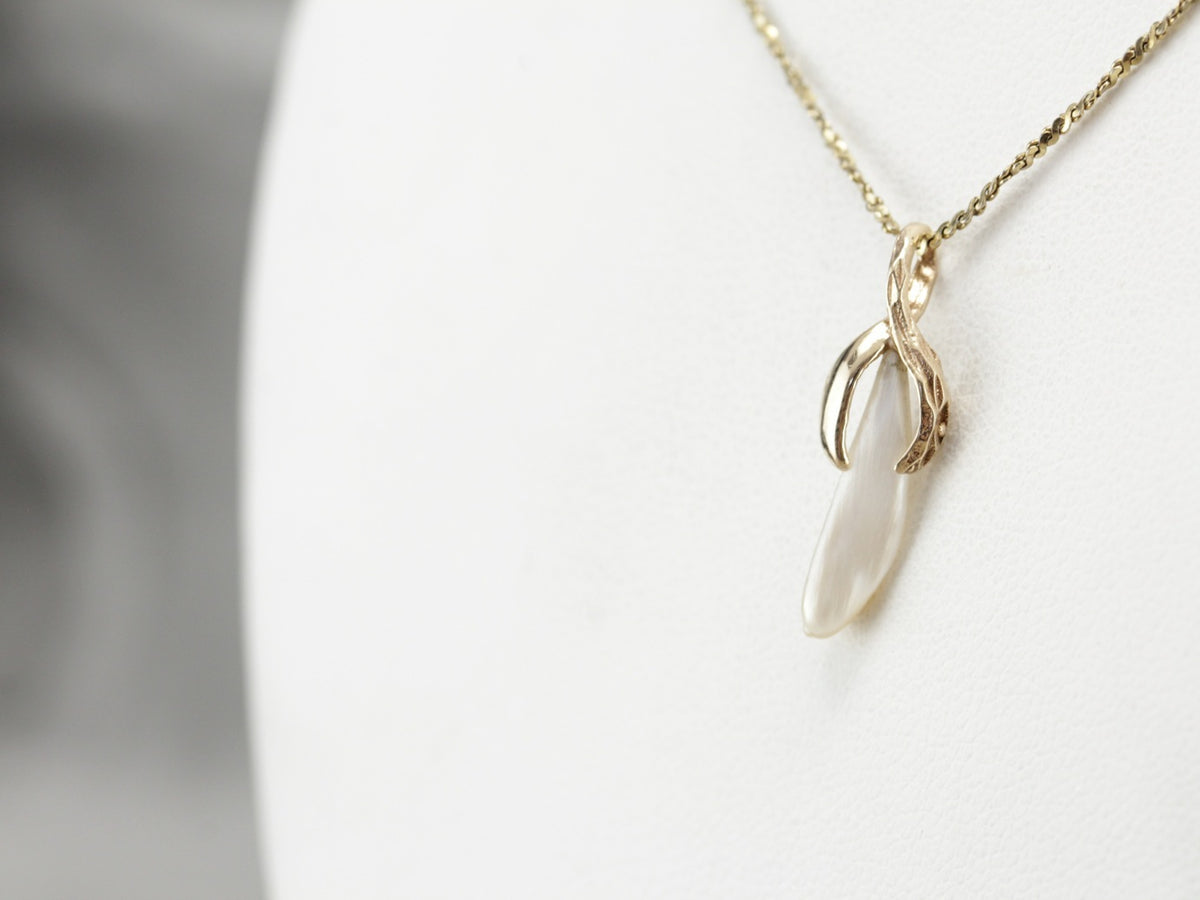 Natural Pearl Pendant in Yellow Gold