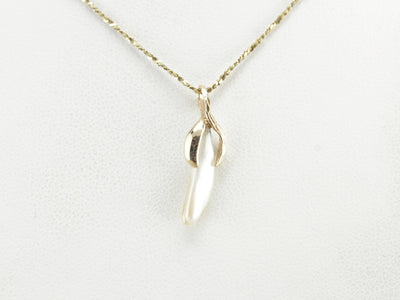 Natural Pearl Pendant in Yellow Gold