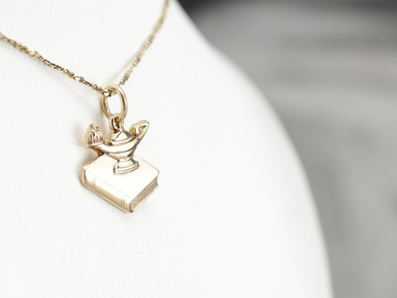 Gold Oil Lamp and Book Pendant