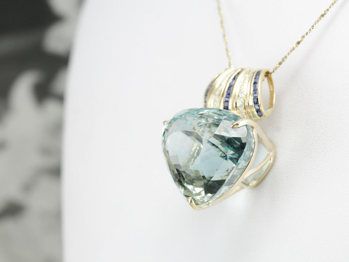 Blue Topaz, Sapphire, and Diamond Pendant