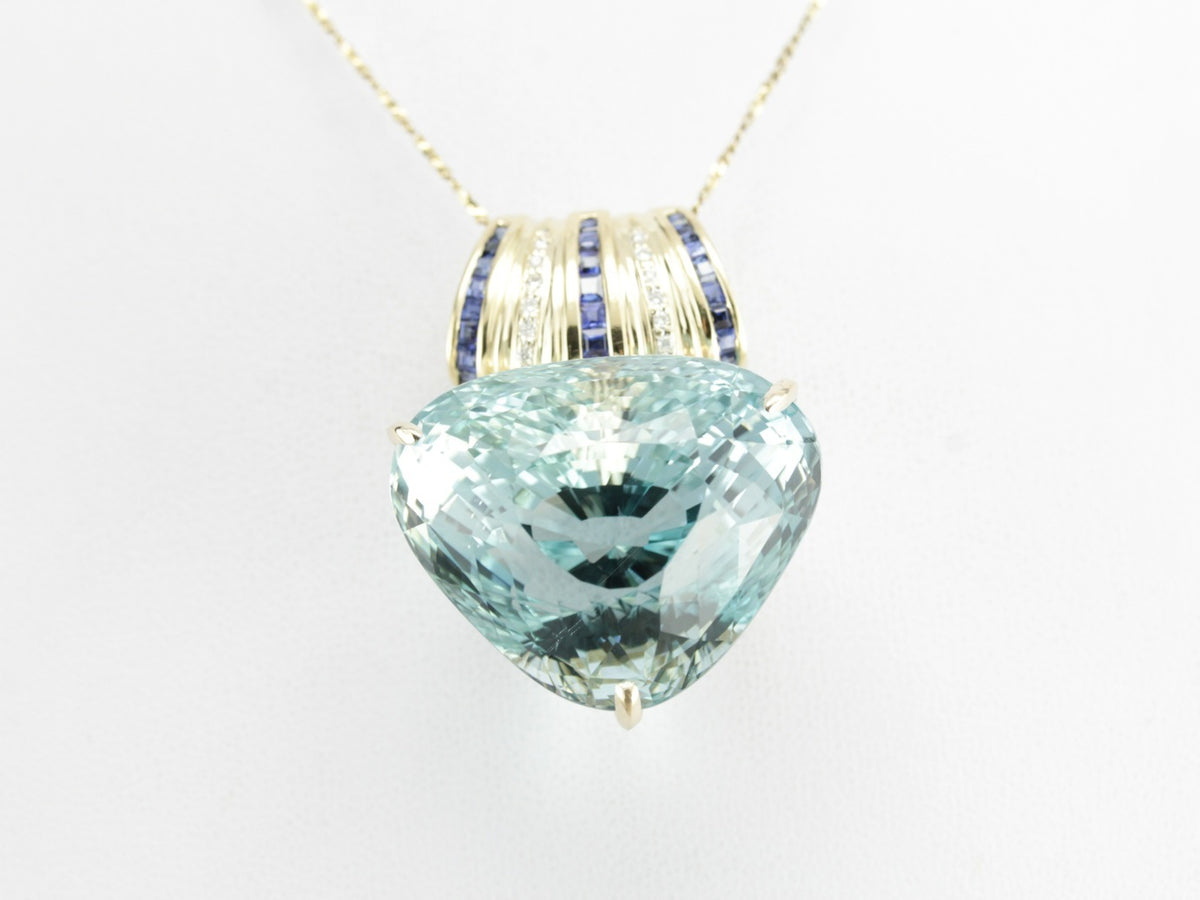 Blue Topaz, Sapphire, and Diamond Pendant