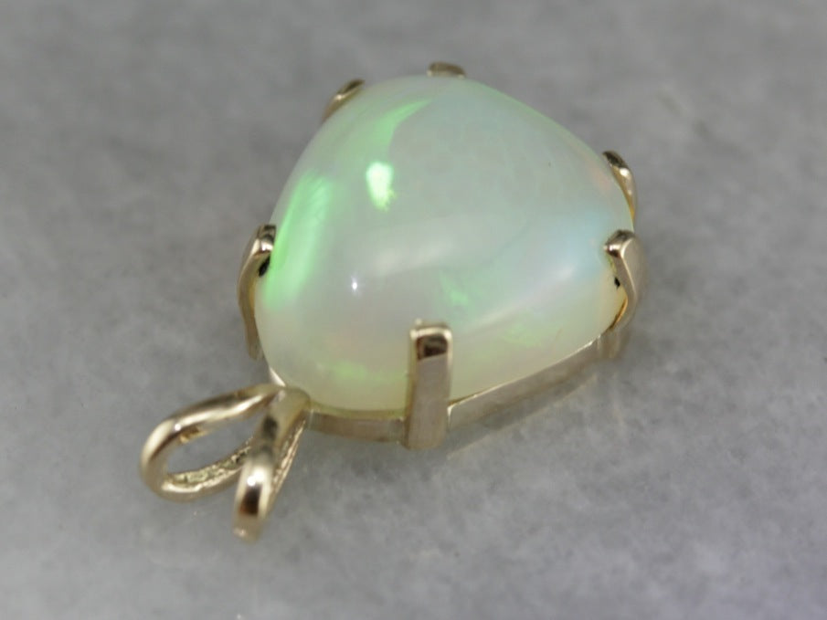 Pear Cut Opal Pendant in Yellow Gold