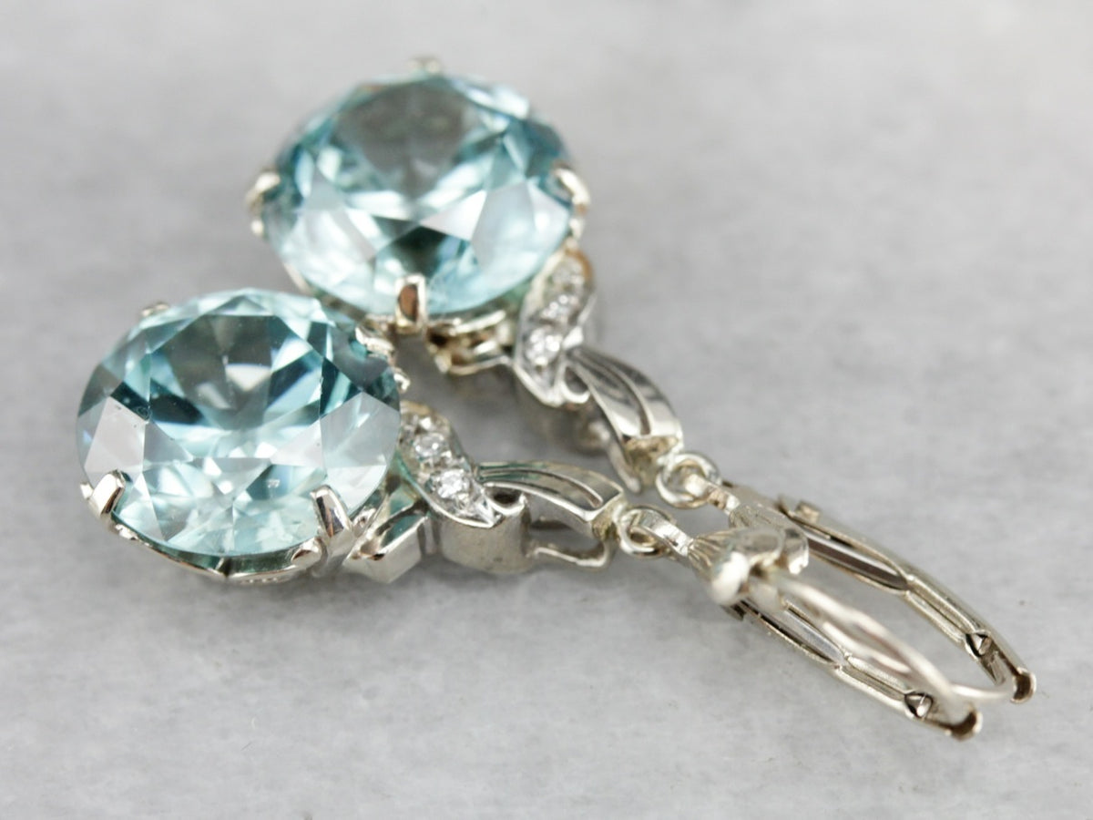 Pendientes colgantes de diamantes y circonitas azules