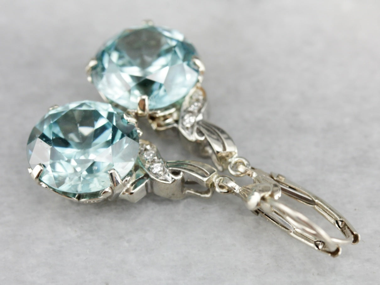 Pendientes colgantes de diamantes y circonitas azules