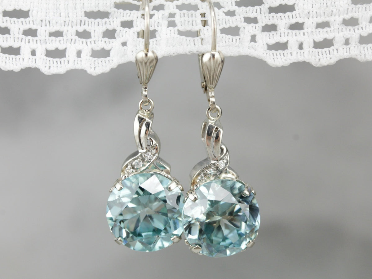 Pendientes colgantes de diamantes y circonitas azules