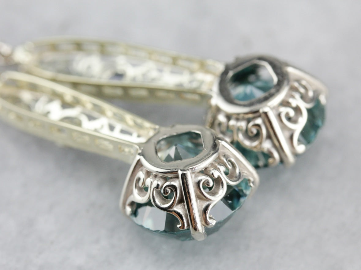 Pendientes colgantes de filigrana de circonitas azules y zafiros