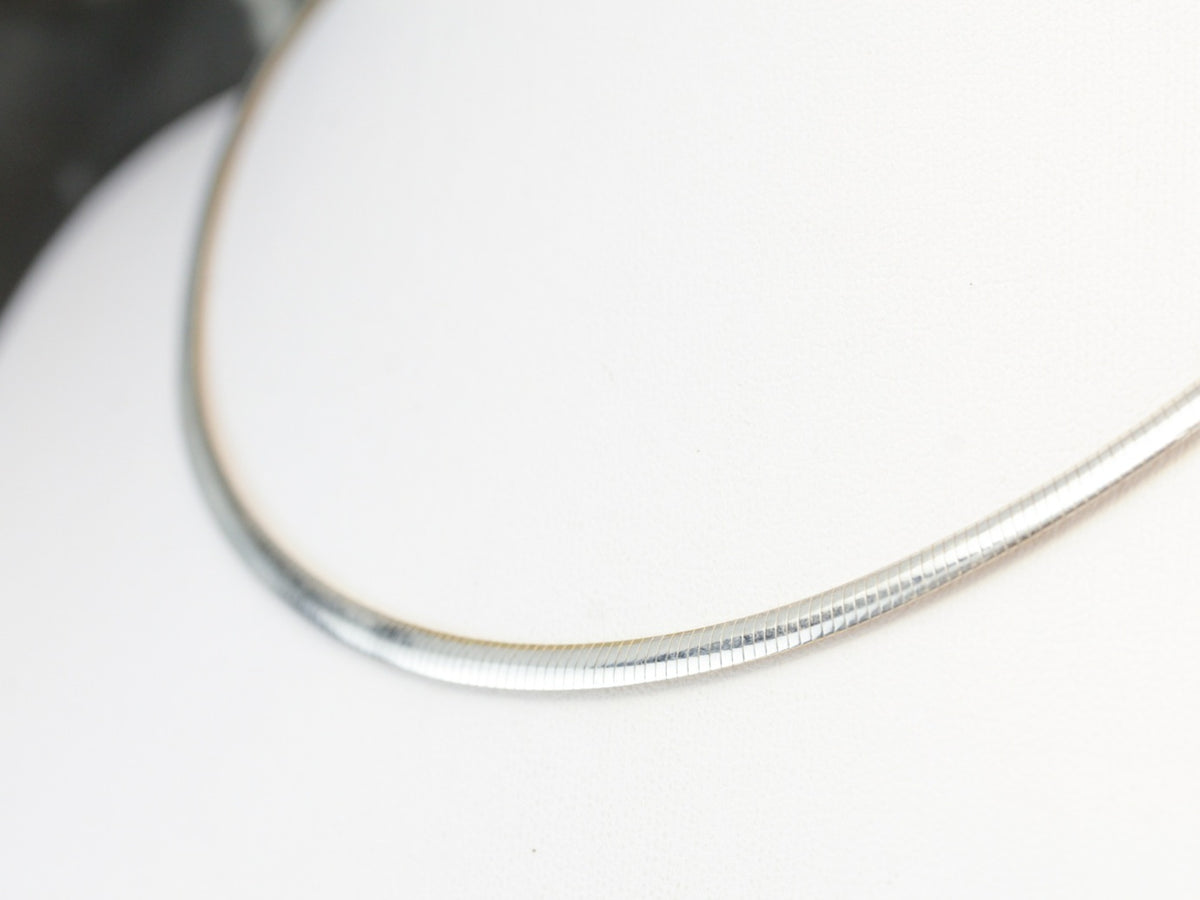 Reversible Omega Chain