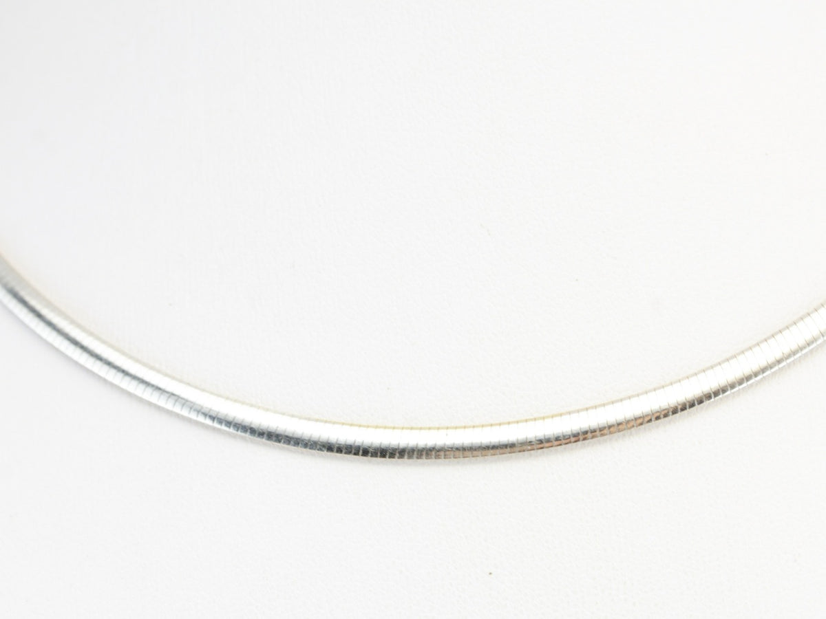 Reversible Omega Chain