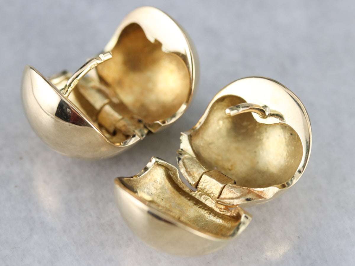 Aretes tipo argolla de oro de alto quilate