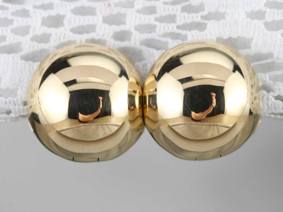 Aretes tipo argolla de oro de alto quilate