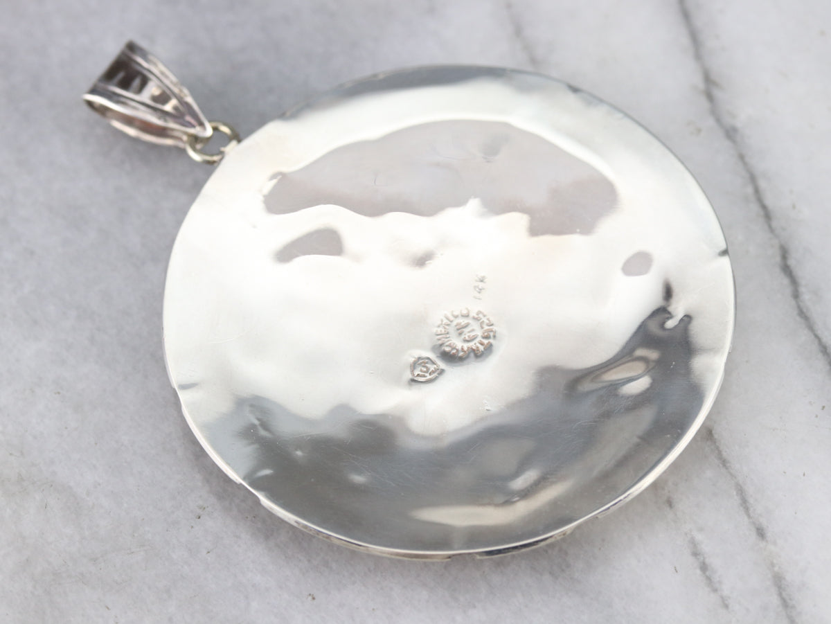 Colgante de águila de diamantes en oro y plata