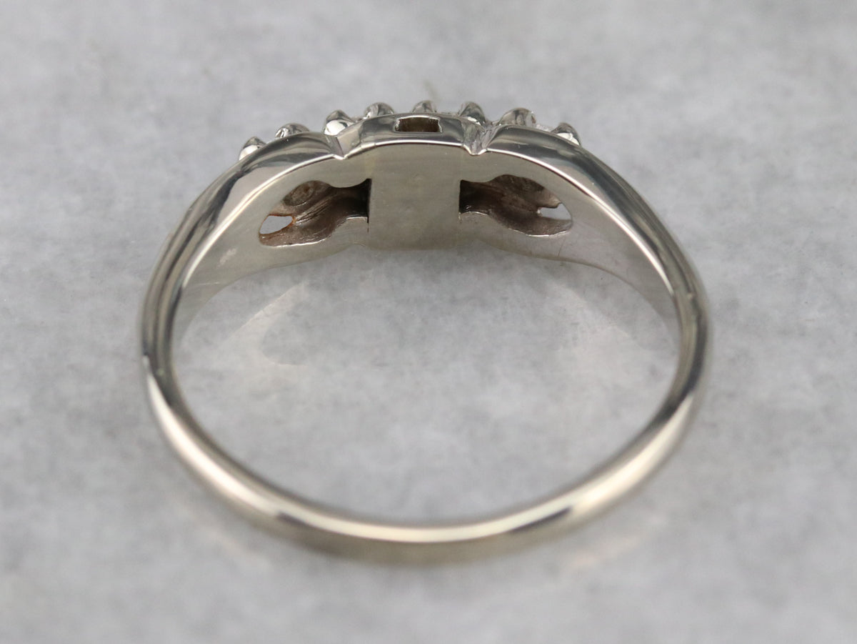 Anillo de novia de oro blanco con cuatro diamantes