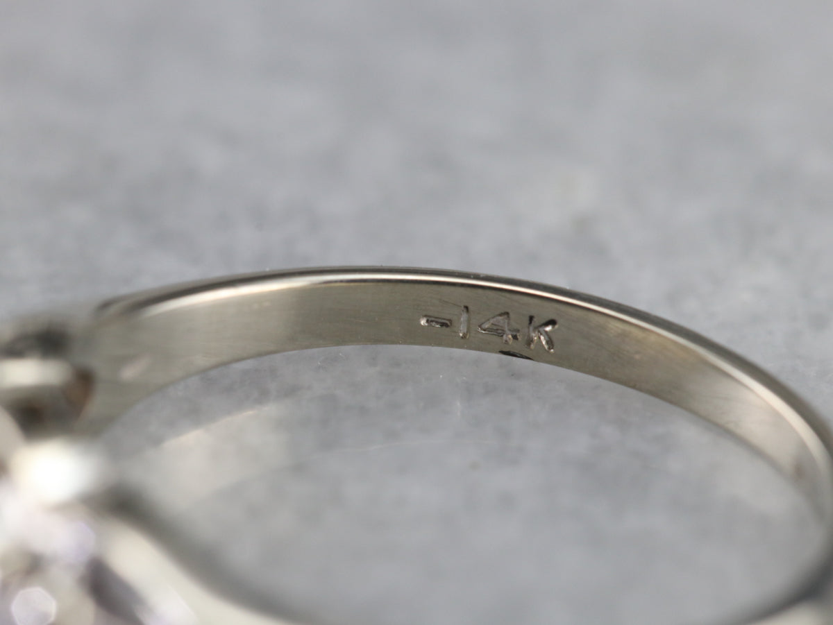 Anillo de novia de oro blanco con cuatro diamantes