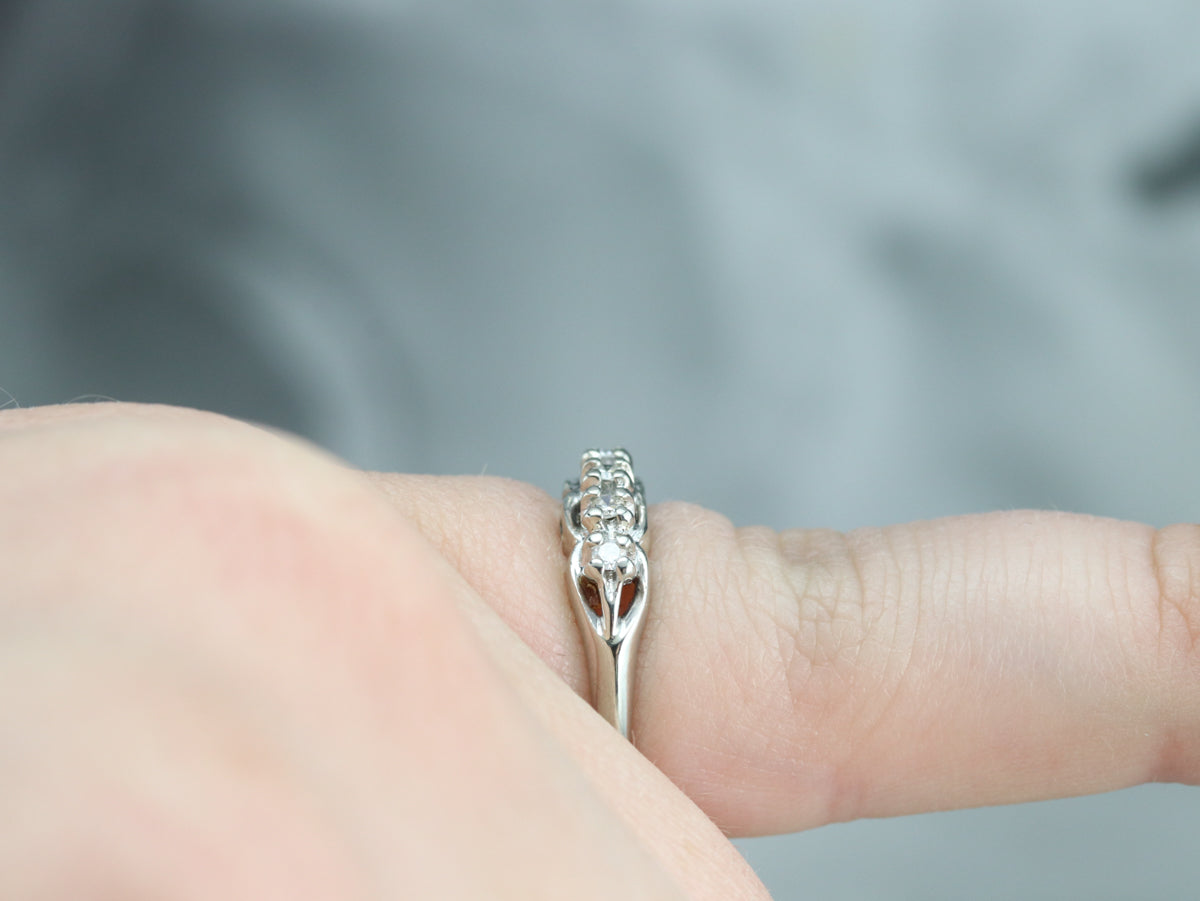 Anillo de novia de oro blanco con cuatro diamantes