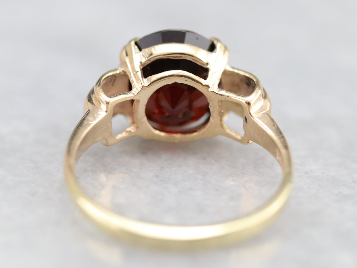 Retro Era Garnet Solitaire Ring