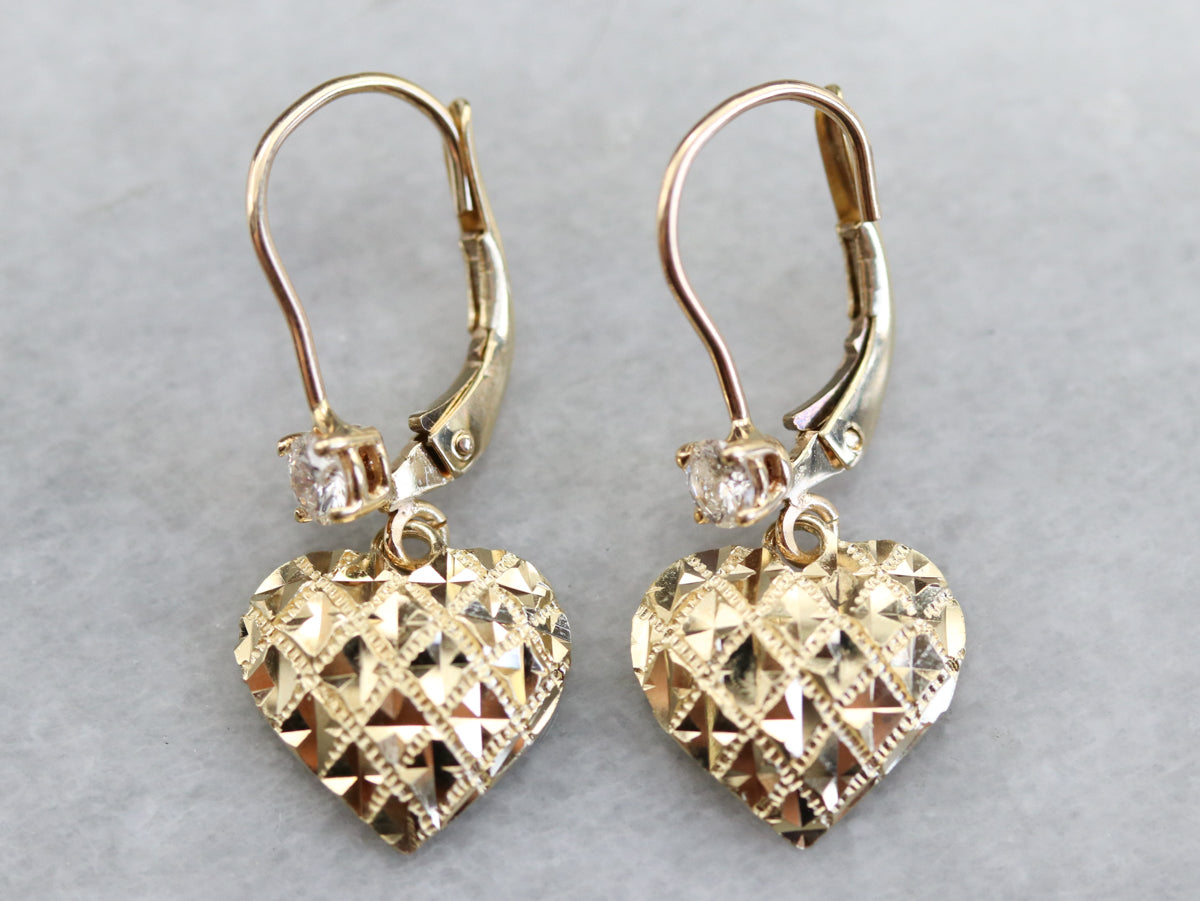 Pendientes colgantes de corazón de diamantes dorados