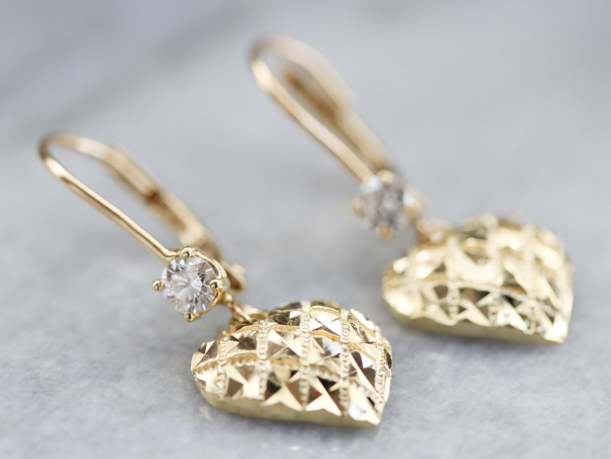 Pendientes colgantes de corazón de diamantes dorados