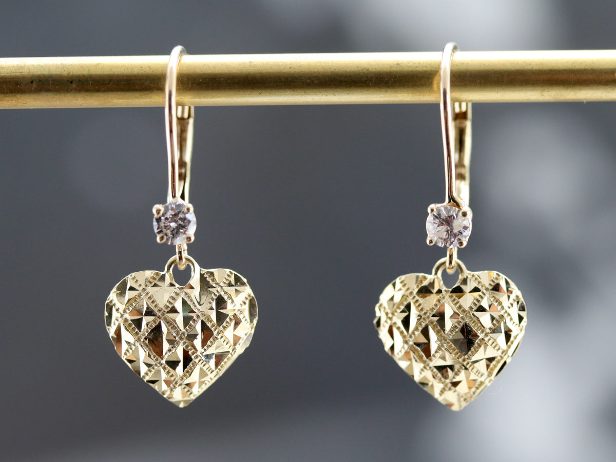 Pendientes colgantes de corazón de diamantes dorados