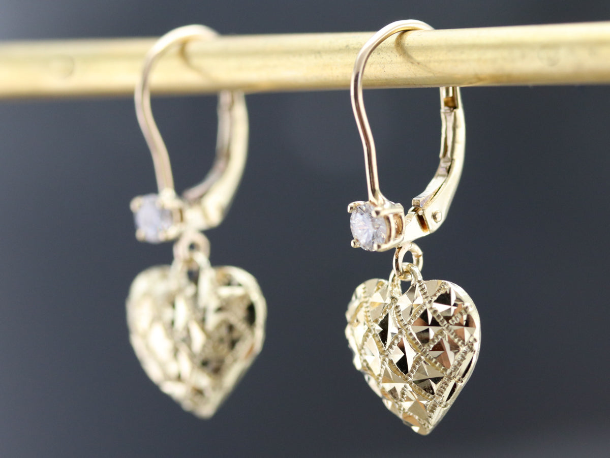 Pendientes colgantes de corazón de diamantes dorados