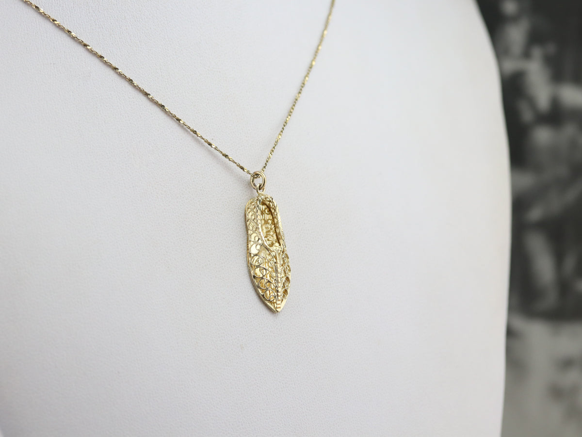 Ornate Gold Filigree Sandal Charm