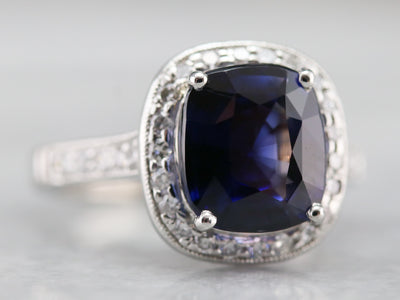 Cushion Cut Sapphire and Diamond Halo Ring