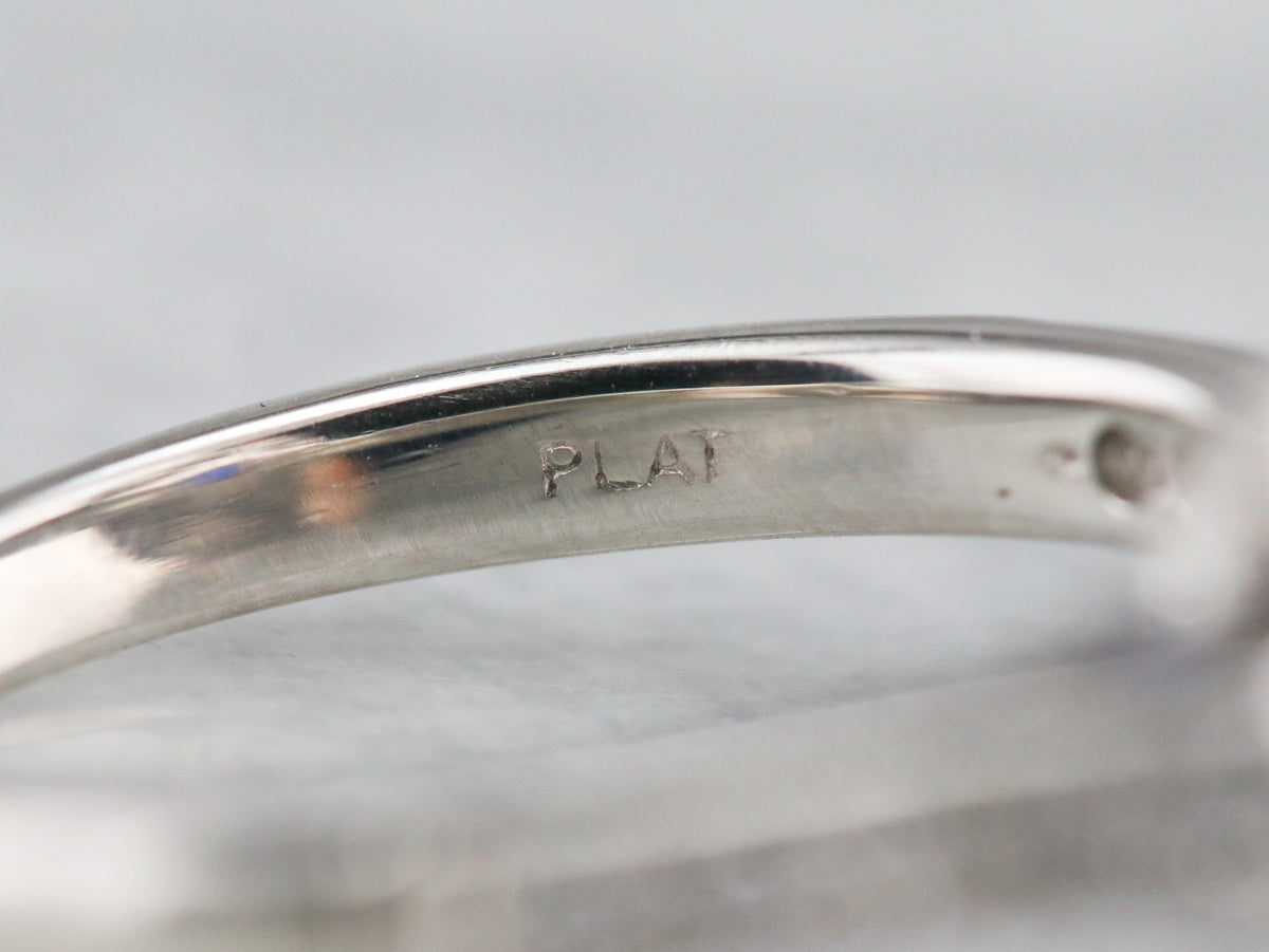 Cushion Cut Sapphire and Diamond Halo Ring