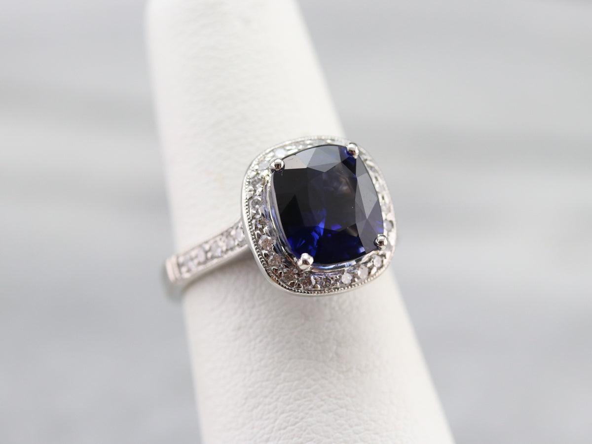 Cushion Cut Sapphire and Diamond Halo Ring
