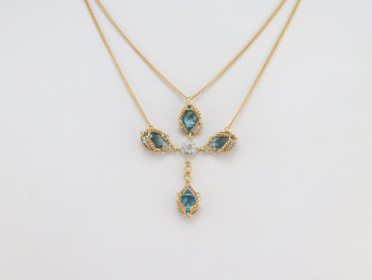 Collar Cruz Oro Topacio Azul y Diamantes