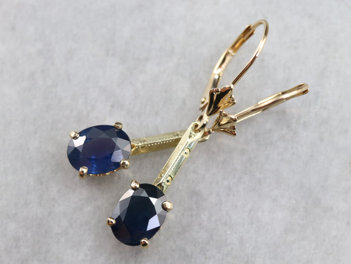 Pendientes colgantes de zafiro y oro