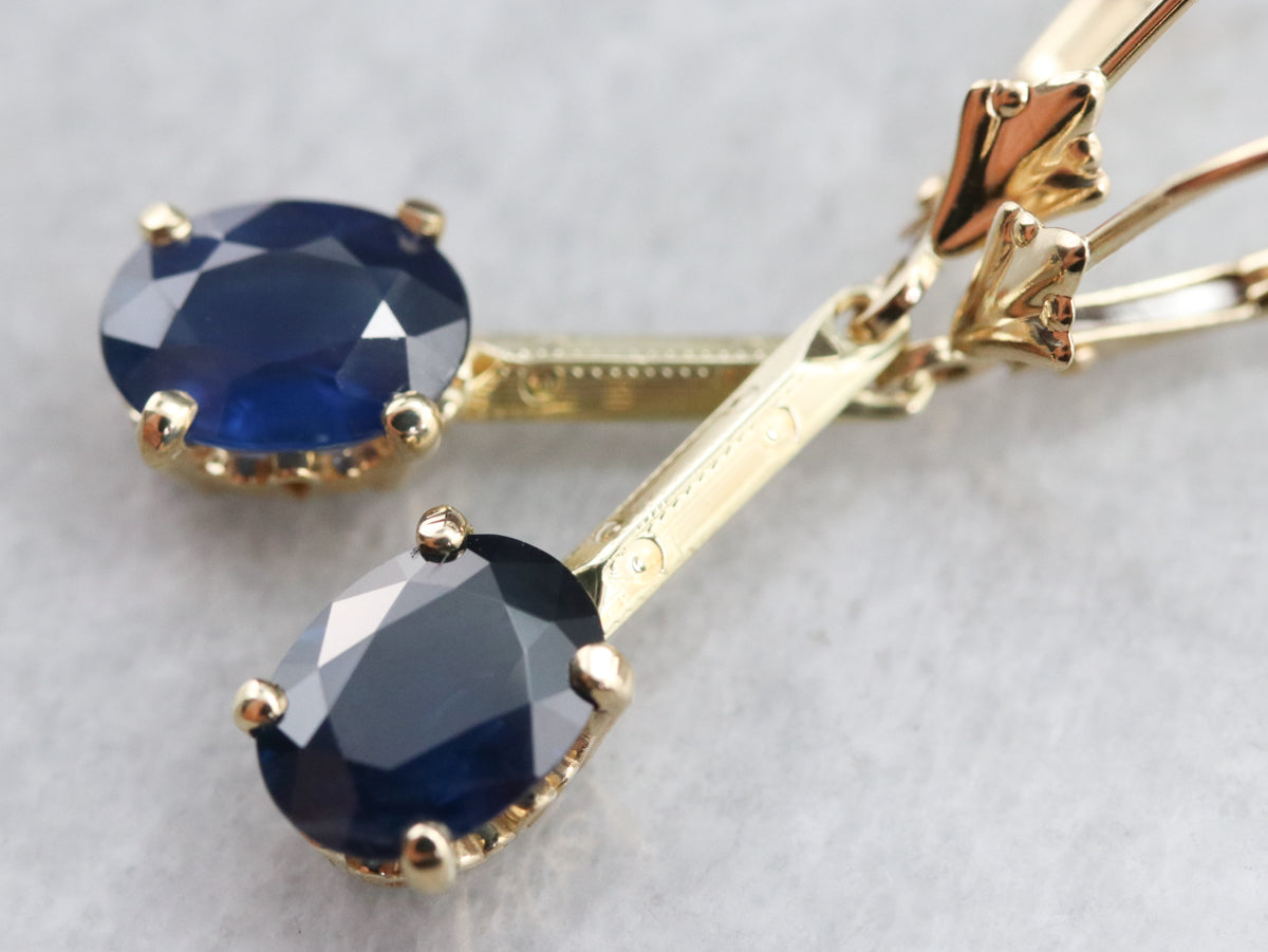 Pendientes colgantes de zafiro y oro