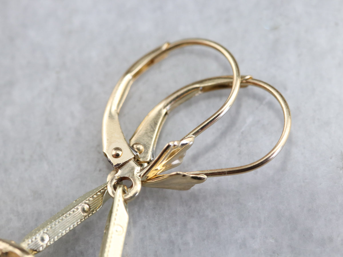 Pendientes colgantes de zafiro y oro