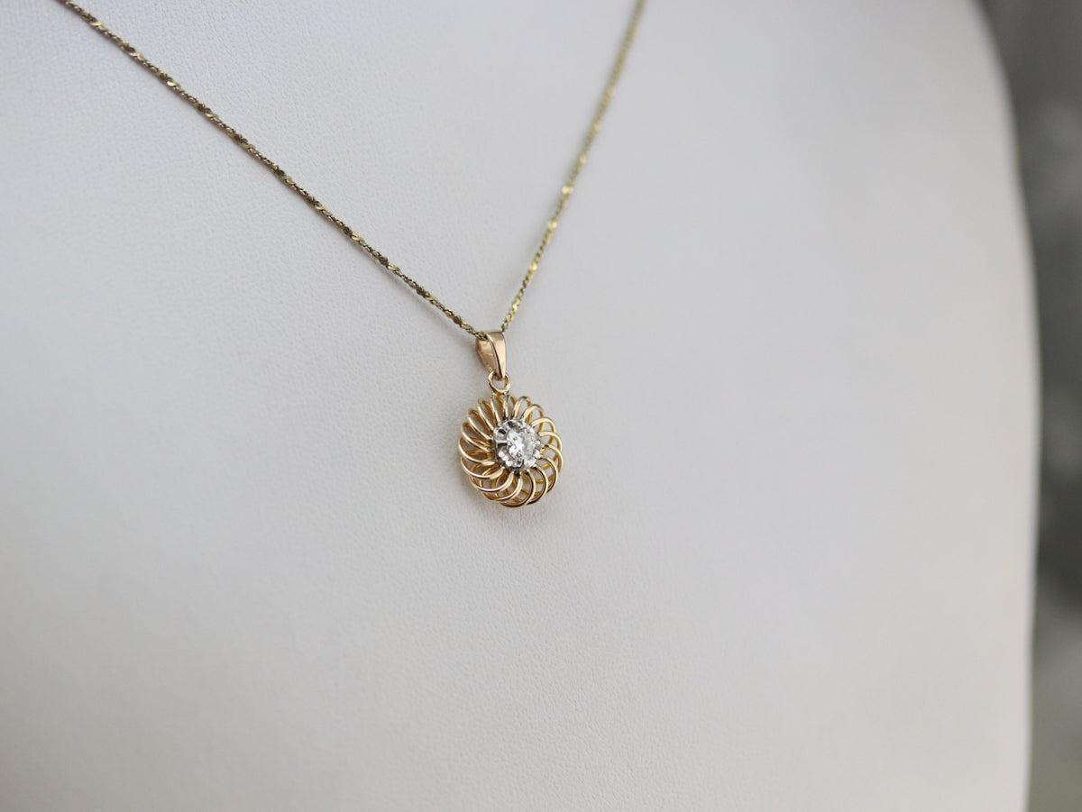 Swirling Gold and Diamond Pendant