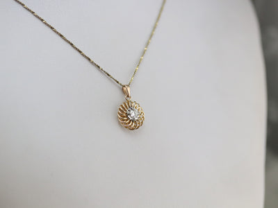 Swirling Gold and Diamond Pendant