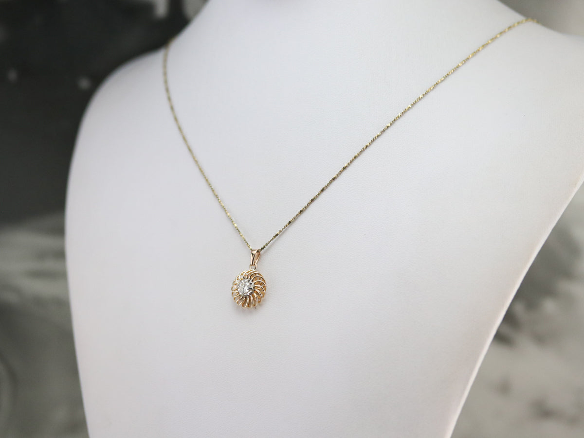 Swirling Gold and Diamond Pendant