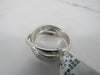 Solid Silver and Cubic Zirconia Band Crossover Ring