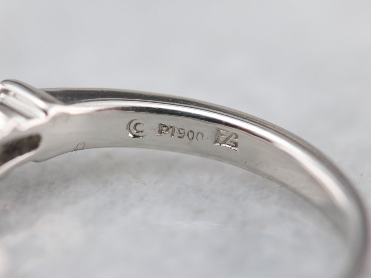 Modern Platinum Sapphire and Diamond Engagement Ring