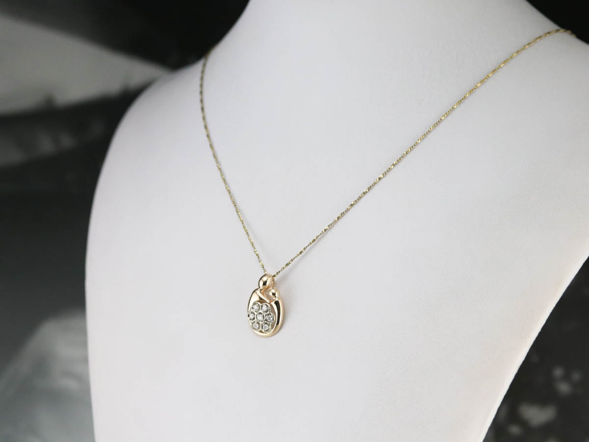 Mother and Child Diamond Gold Pendant