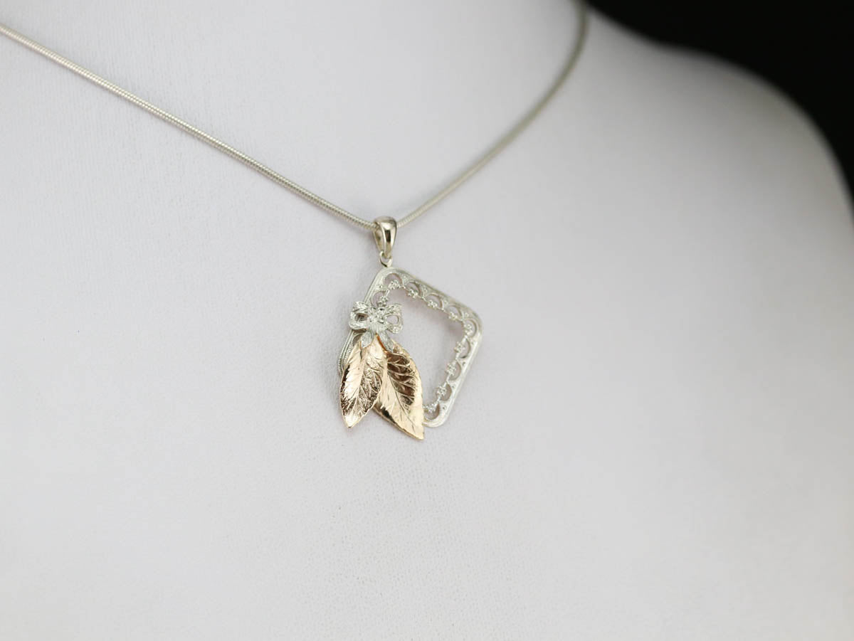 Filigree Botanical Frame Gold Pendant