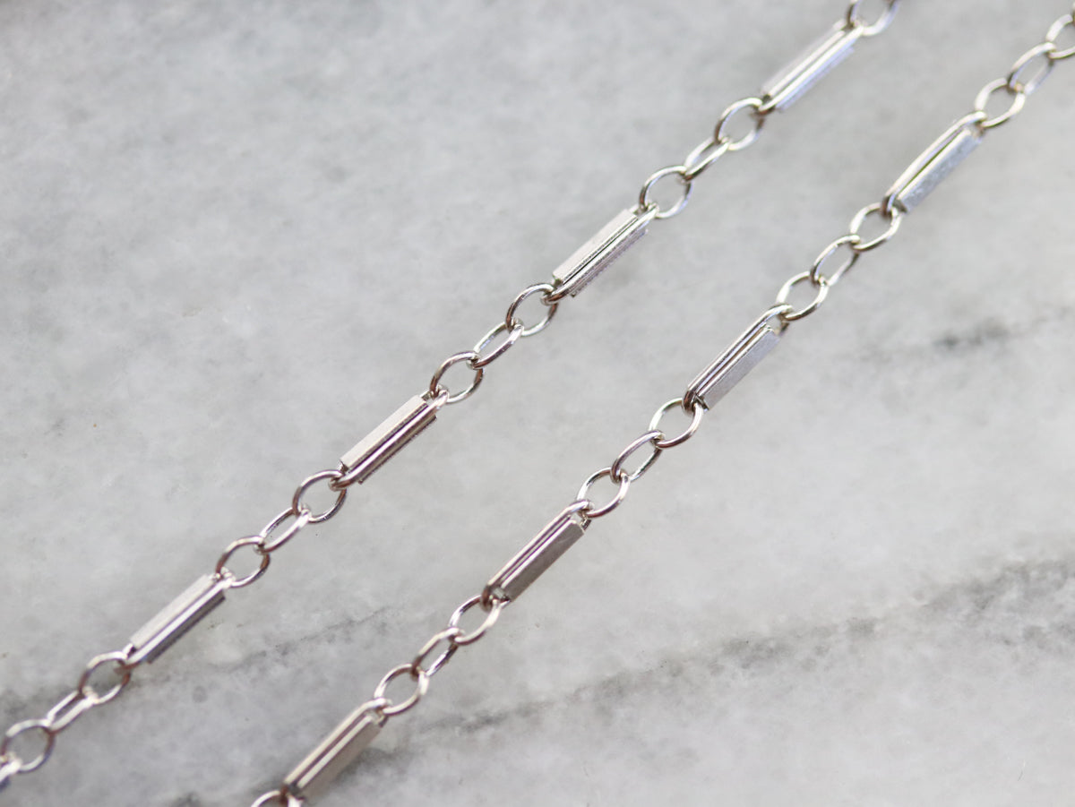 Collar Oro Blanco Letra "W" con Diamantes