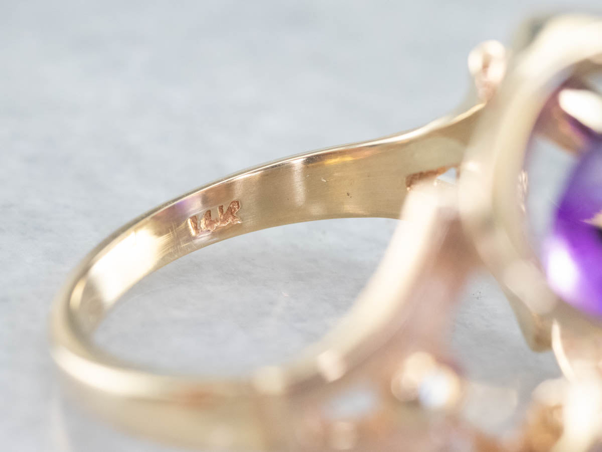 Anillo llamativo de amatista en oro amarillo