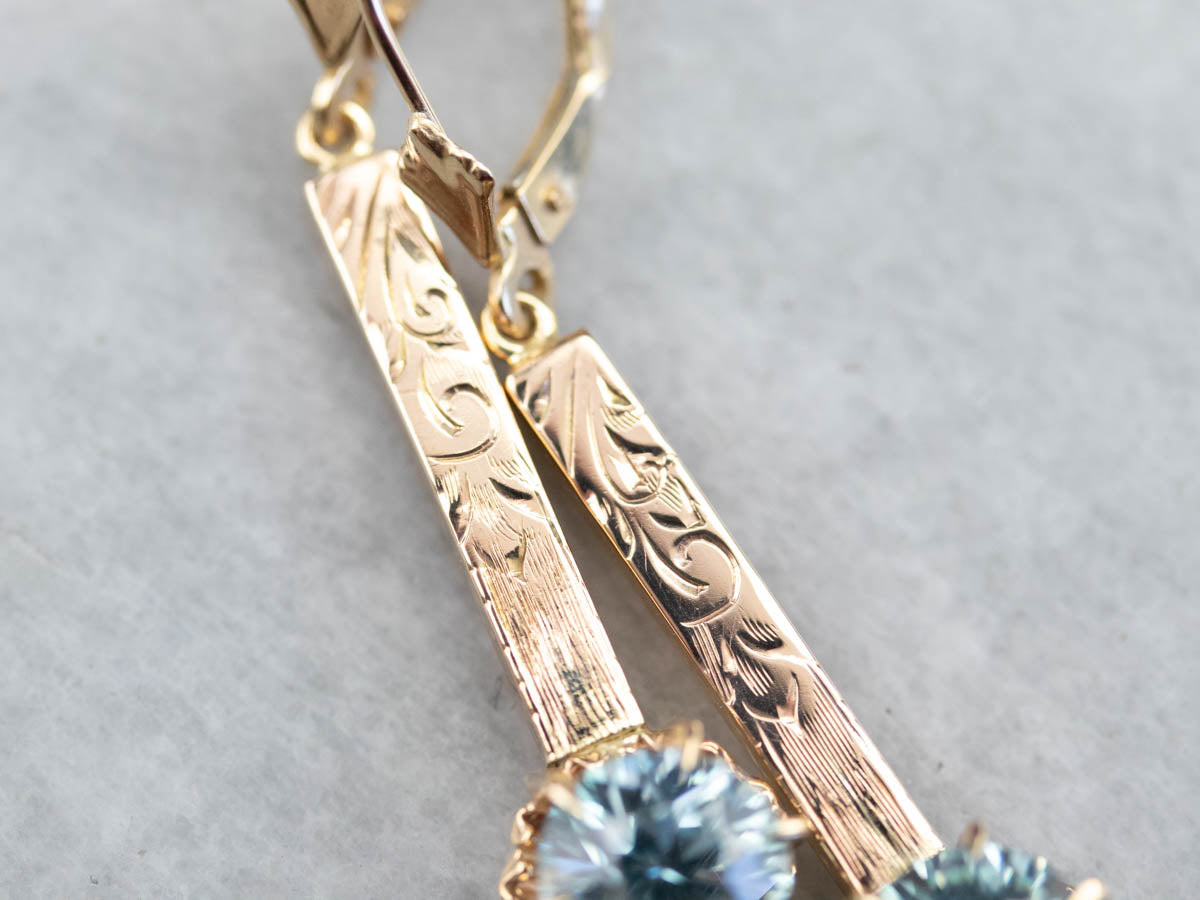 Blue Zircon Ornate Gold Bar Drop Earrings