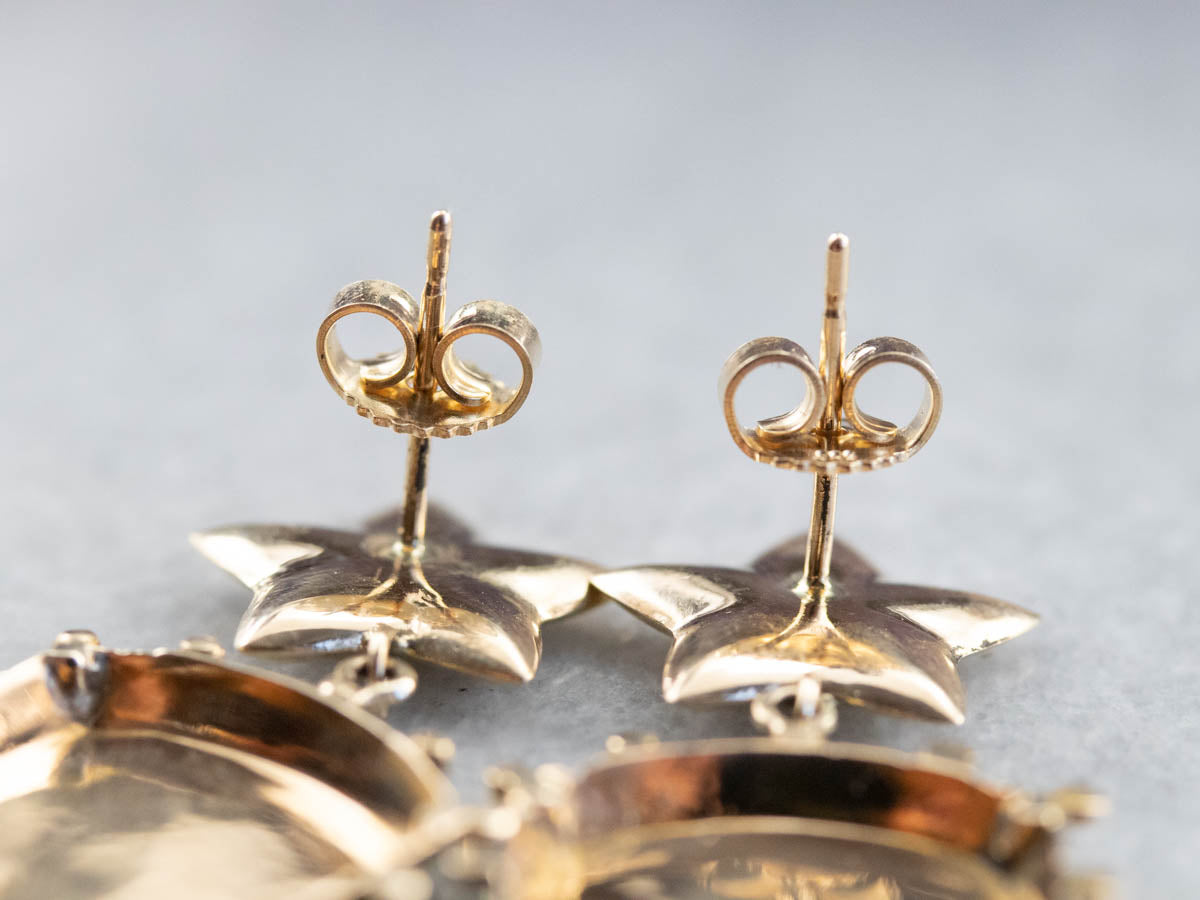 Pendientes colgantes de oro con textura adornada