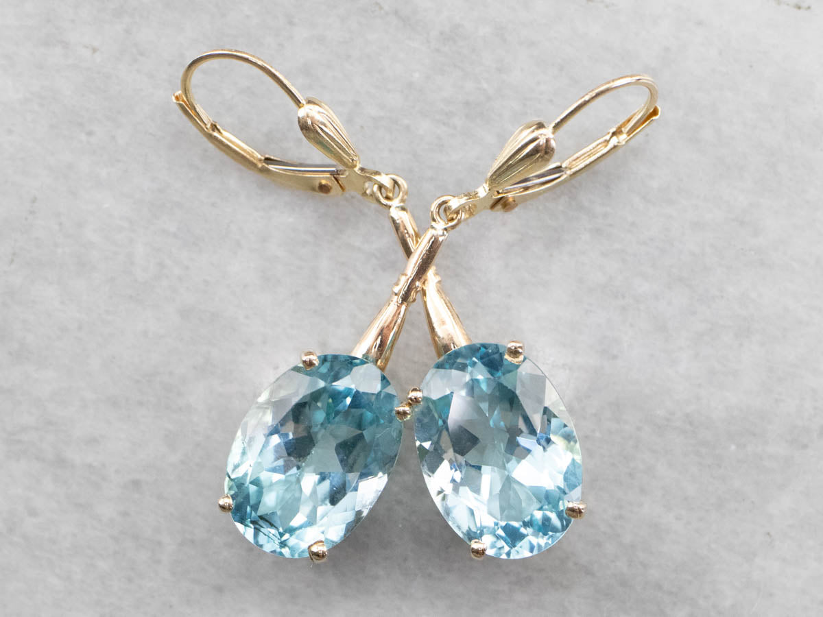 Pendientes colgantes de topacio azul dorado