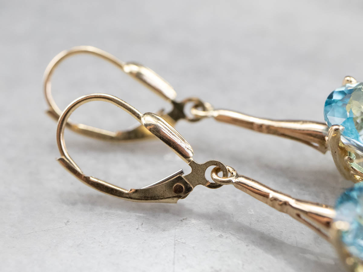 Pendientes colgantes de topacio azul dorado