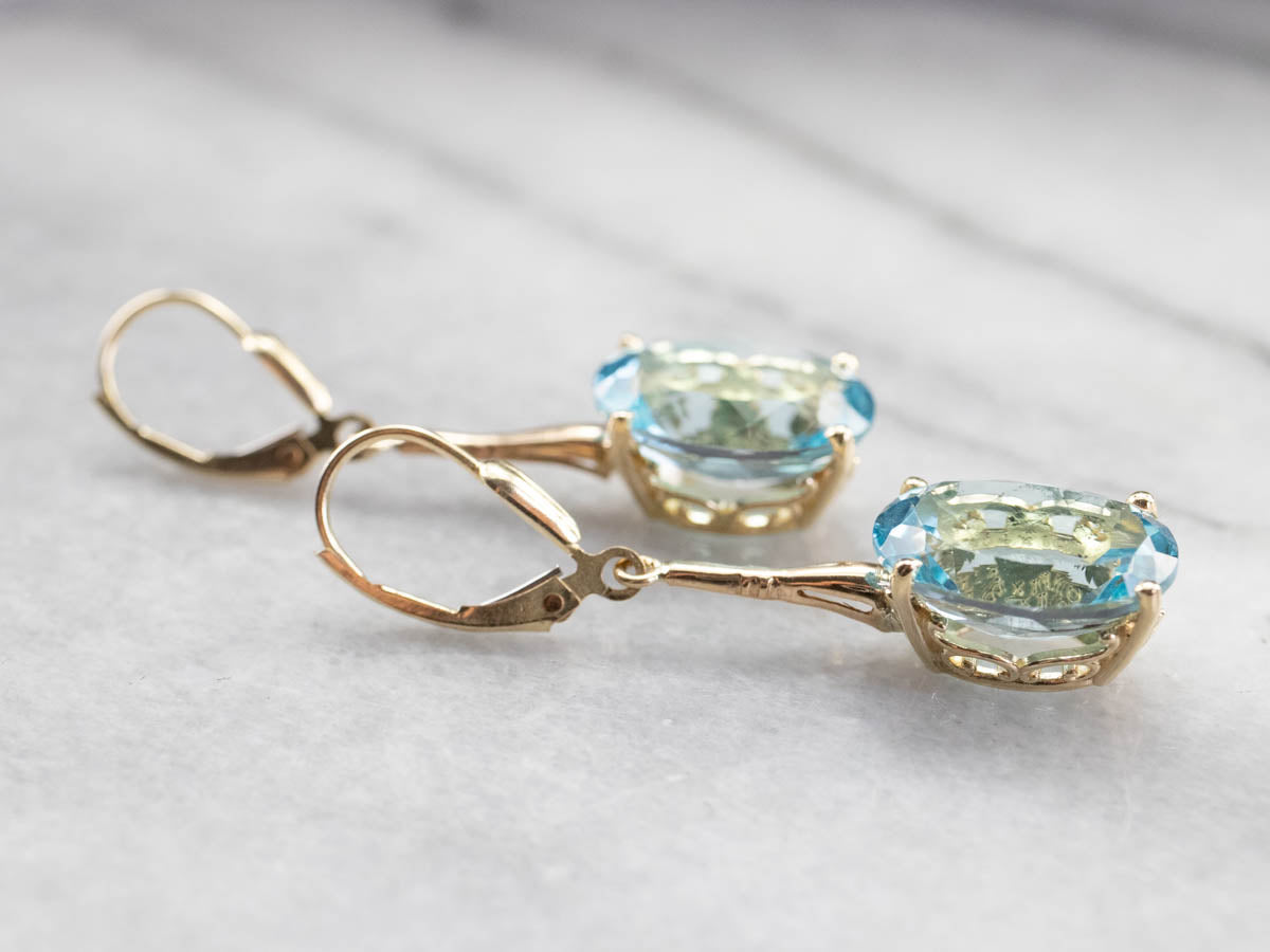 Pendientes colgantes de topacio azul dorado