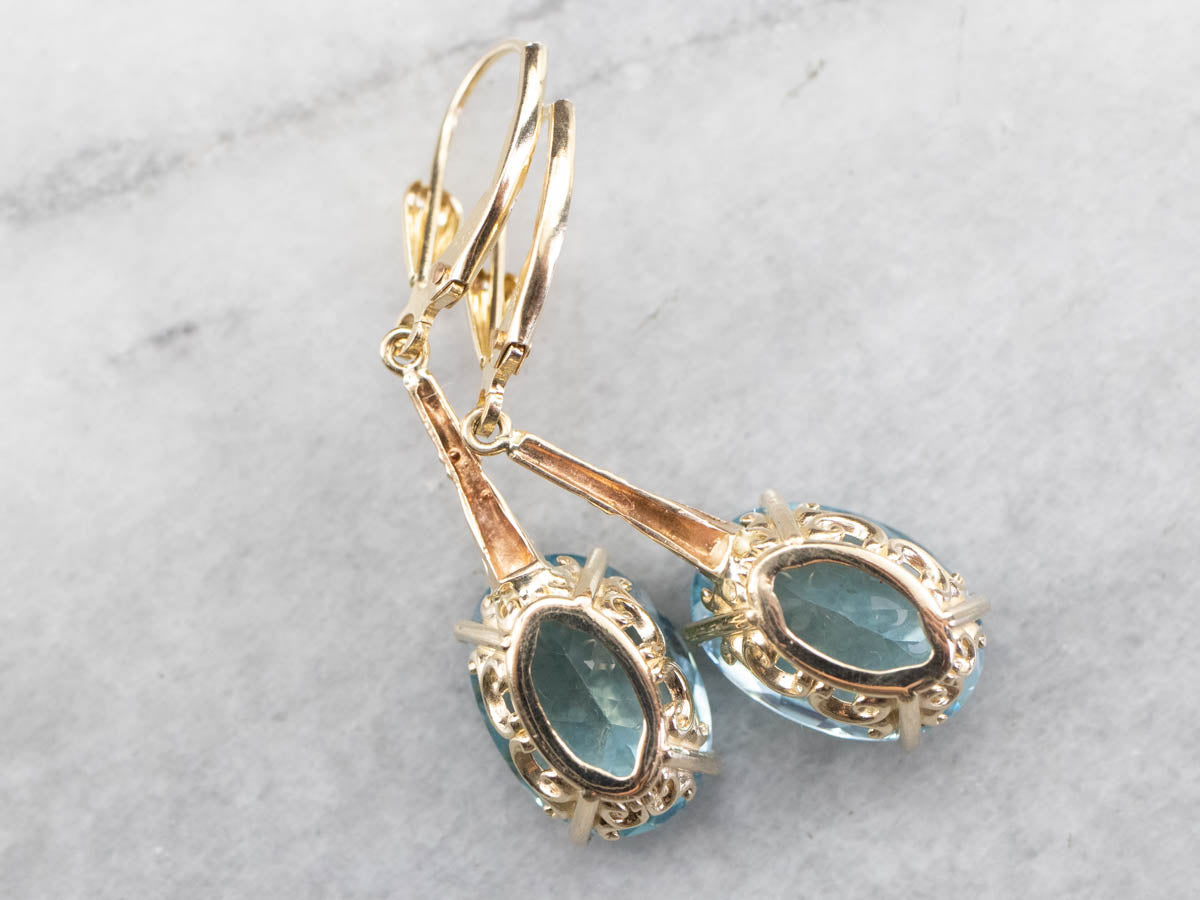 Pendientes colgantes de topacio azul dorado