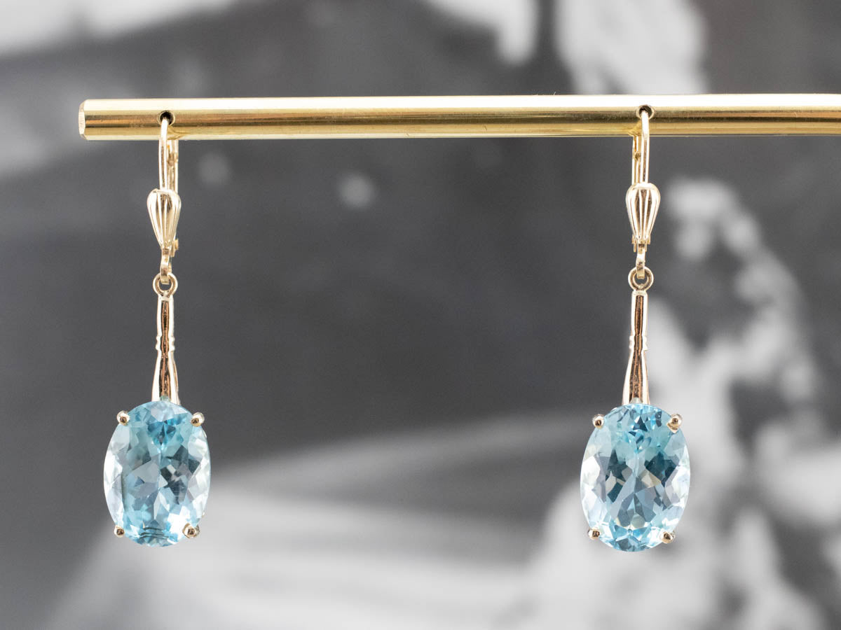 Pendientes colgantes de topacio azul dorado