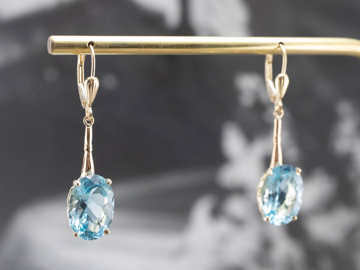 Pendientes colgantes de topacio azul dorado