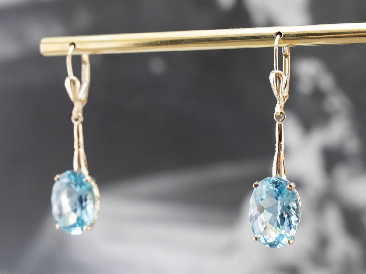 Pendientes colgantes de topacio azul dorado