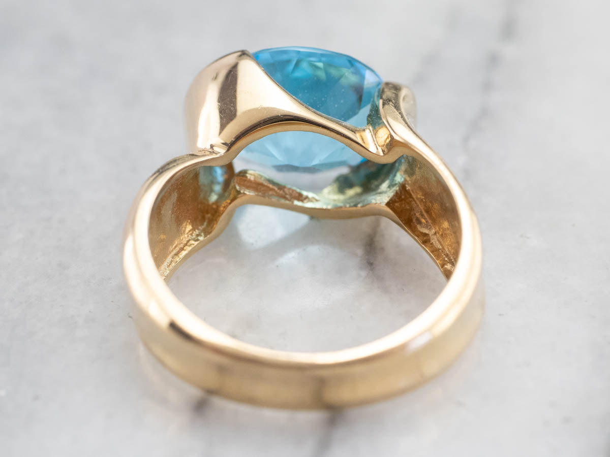 East to West Blue Topaz Modernist Gold Ring